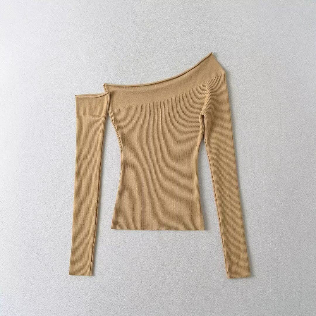 Solid color off shoulder top with sloping shoulders